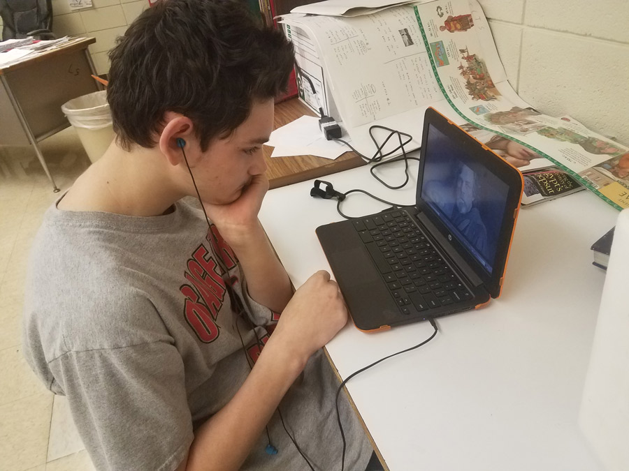 Sophomore Logan Maggard watches the trailer for the new movie,