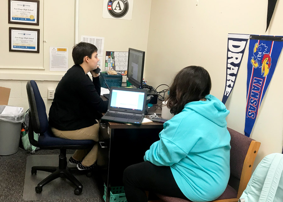 New Career and College Adviser Ms. Krystal Brier assists senior Katherine Ortiz in filling out a college application. Ms. Brier joined the Fort Osage High School staff at the start of the 2018-19 school year.