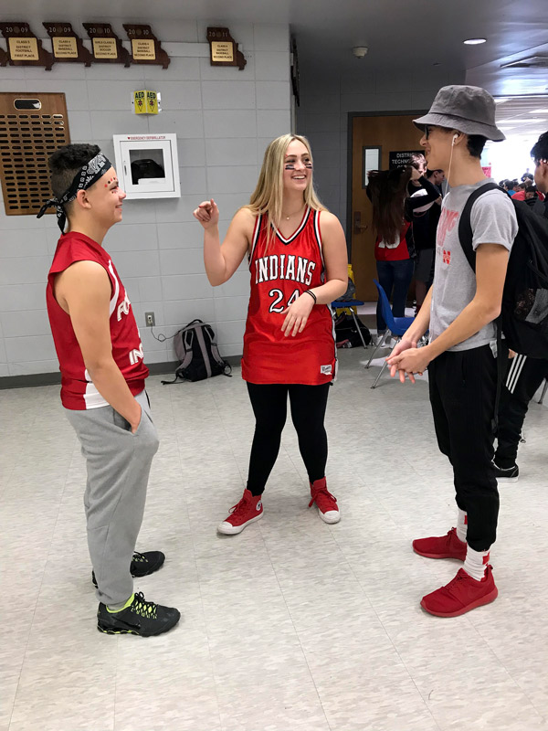 Sophomore Ronnie Howard, senior Baylee Bowen and junior
A.J. Wilson show off their school spirit with their Fort Spirit wear. Courtwarming Spirit Week ended today with Indian Pride Day.