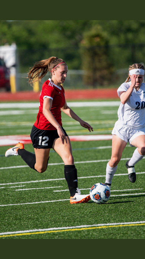 Dribbling the ball down field, Sophomore Aliyah Ayala passes an opponent in a recent match. Ayala led the team with 61 goals this season and earned the GKCSC White Division Player of the Year Honor.
