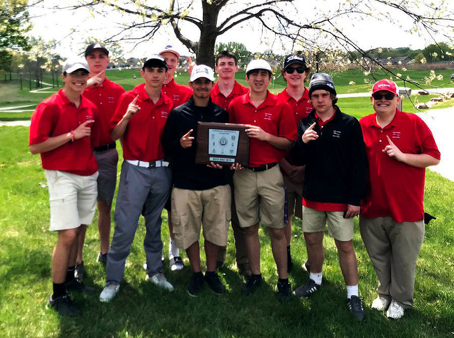 The Boys Varsity Golf team shows off their GKCSC White Division Championship Plaque. The win represents the first Conference title for Boys Golf in school history.