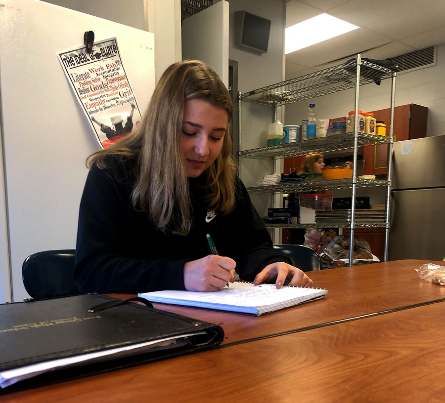 Working+in+class%2C+foreign+exchange+student+Linda+Hoessli+takes+notes.+Hoesslie+and+Signe+Hansen+represent+the+two+exchange+students+for+the+2019-20+school+year.