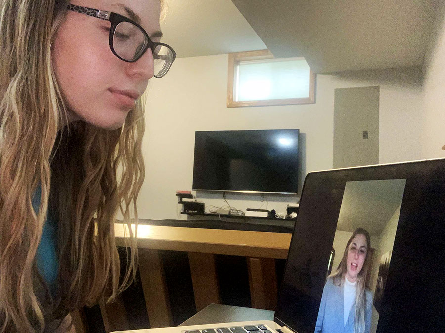 Senior Nicole Overbay views her NCAF Original Oratory entry, Cultural Stigma Around Death, on her laptop in her home. Overbay recently found out she qualified for the NCFL National Tournament that would have been held May 23-24. The event has been canceled due to concerns over COVID-19.