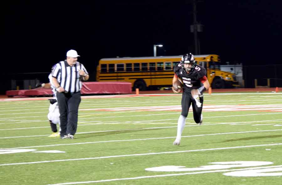 Gaining Yards - Finding an opening, Sophomore Quarterback Greg Menne runs back a kick off return late in the game against Belton. The Indians fell to the Pirates 34-7 and are 0-2 in the GKCSC White Division and 1-4 overall.