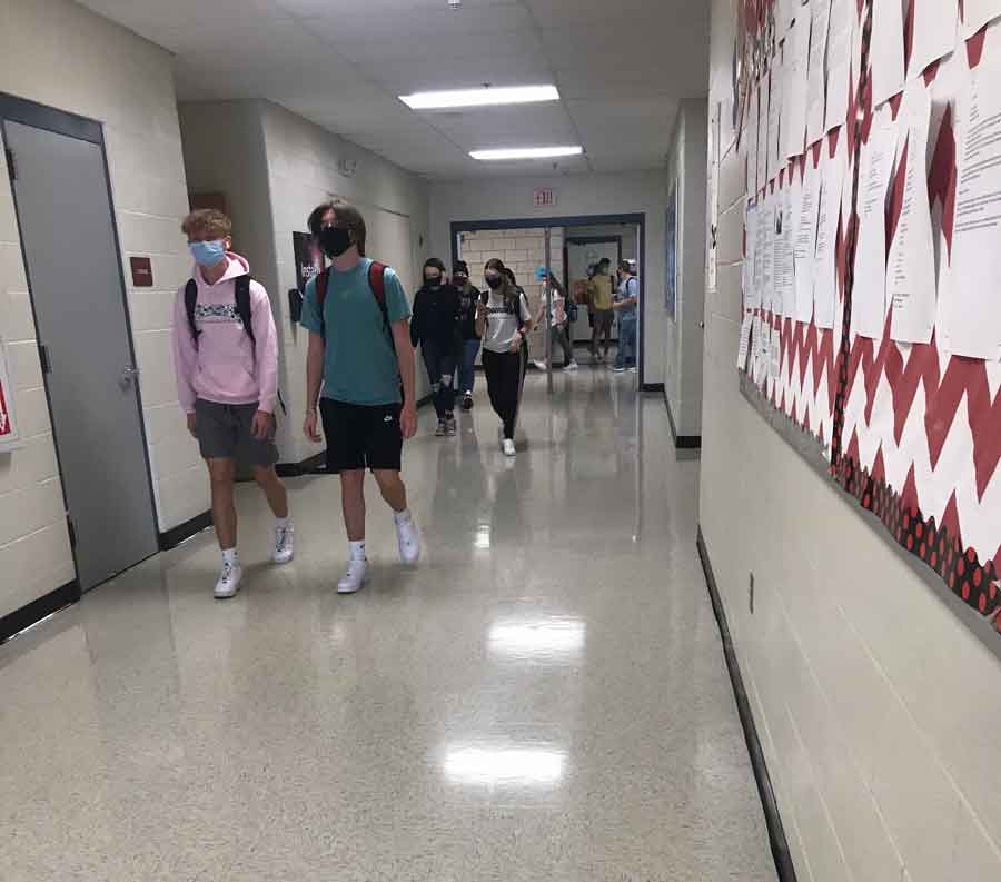 New Look. Walking the halls, students travel to their next class down the PAC Hallway. The hallway originally had carpet but was replaced with tile over the summer of 2020. 