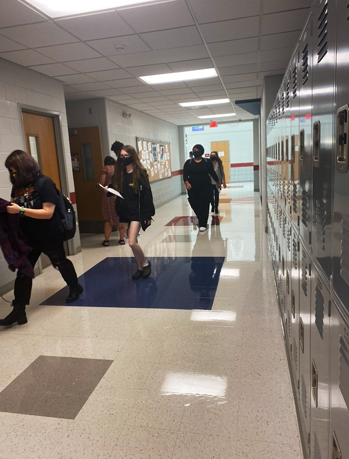 Masked students navigate the halls looking for their classes on the first day. The Fort Osage School District followed the Jackson County Health Department's recommendation to wear masks indoors. 