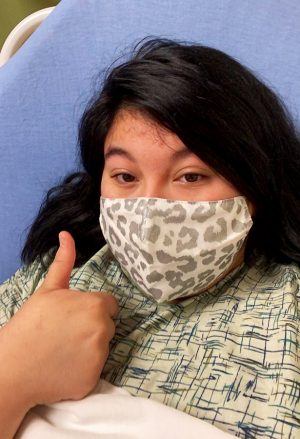 A-OK. Columnist Karina Hernandez gives the thumbs up after her surgery.