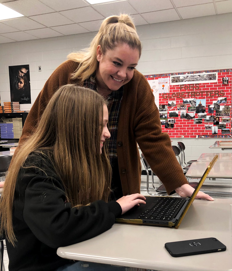 HELP. Offering guidance, English Language Arts teacher Ms. Ashleigh Green helps Freshman Nevaeh Walters with an assignment. Students who need extra help can attend tutoring from 2:45 to 3:45 p.m. on Mondays, Tuesdays, and Wednesdays.