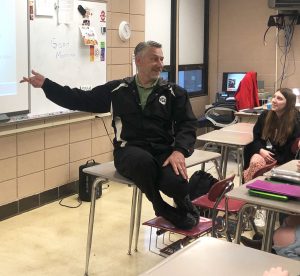 EXPLAINING. During a lecture, Social Studies Teacher Mr. Chris Earley emphasizes a point for his 4th hour class while Junior Lexus Butler listens intently. Mr. Earley plans on retiring at the end of the school year. “It’s been a good year to finish up on,” Mr. Earley said.