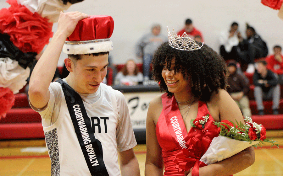 CROWNING.+Smiling+with+excitement%2C+Seniors+Chase+Stumfoll+%28L%29+and+Tatyana+Blankenship+%28R%29+share+a+moment+after+they+were+named+Courtwarming+King+and+Queen.+Stumfoll+and+Blankenship+are+both+involved+in+Student+Council+along+with+other+sports+and+activities.+%E2%80%9CI+felt+very+loved+and+appreciated+by+my+peers+after+winning%2C%E2%80%9D+Blankenship+said+Via+Snapchat.+