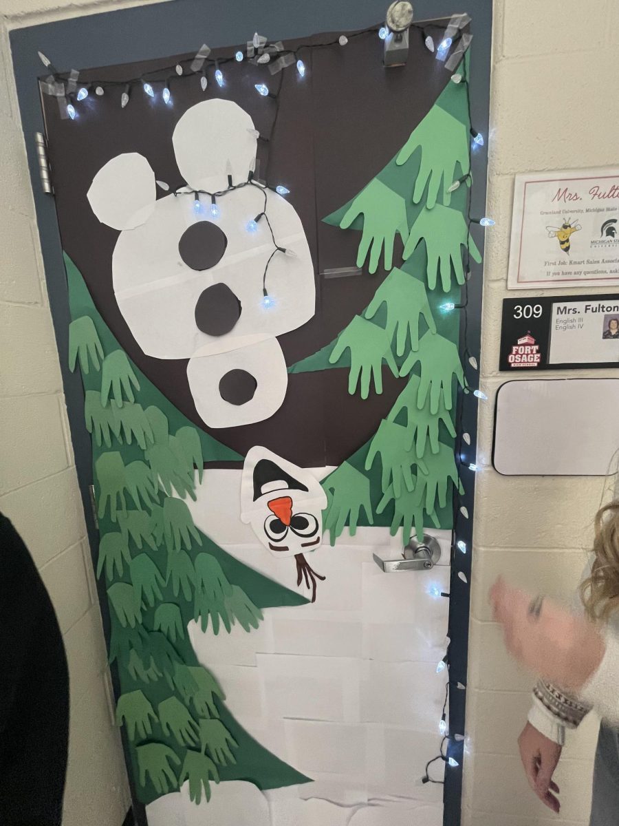 Ms. fultons door with Olaf and christmas lights!
