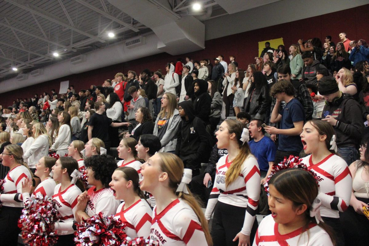 Students+cheer+at+the+Court+warming+Pep+Assembly+during+7th+hour+before+the+game.+They+also+announced+the+Court+warming+underclassmen+royalty+at+the+assembly%2C+while+playing+games+to+increase+student+participation.