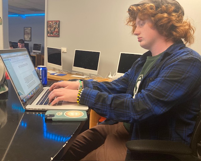 Senior Dylan Daugherty works on a feature story in his Mass Media class. Daugherty plans to attend NorthWest Missouri State University for four years. Daugherty believes he will thrive in the college environment. “I really love doing this,” Daugherty said, “I’m good at it and I think I will have an amazing experience in college.”
