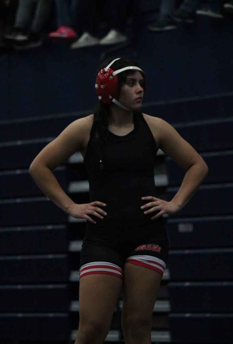 ANTICIPATING. Alina Wackerman prepares for the next period of her match at Oak Park. Wackerman finished first in her weight class. "I'de like to qualify and a dream would be to medal. I want to make my dad proud." Wackerman said.   